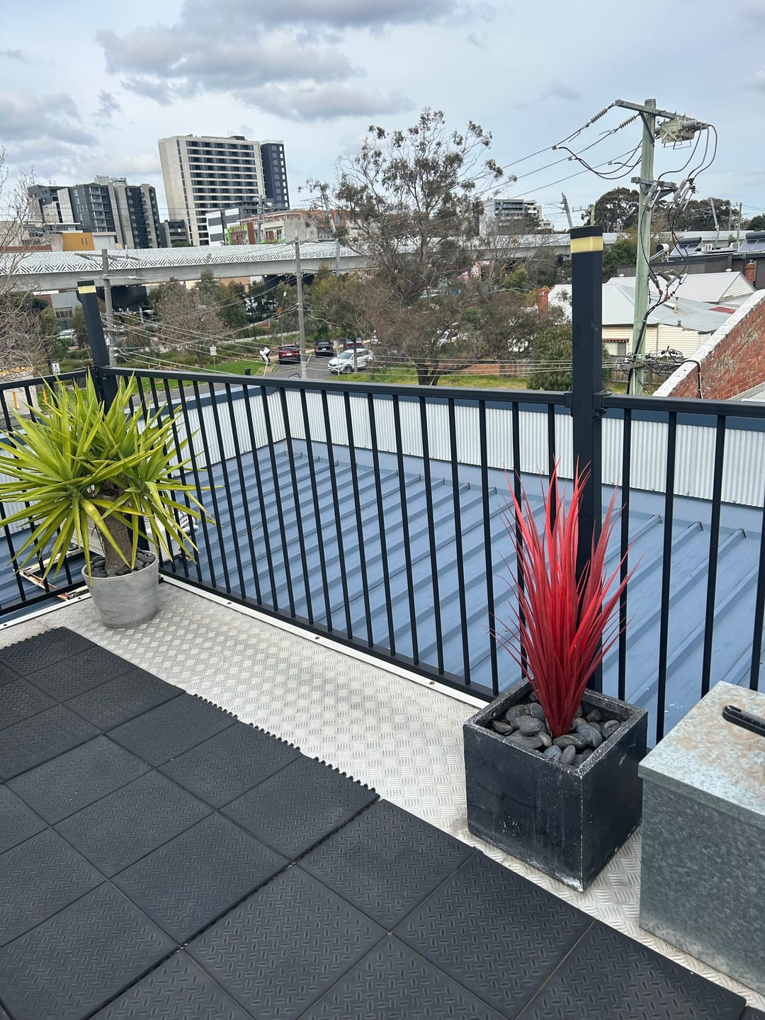 Customer photo review of Burgundy Potted Artificial Long Grass (Yucca Grass) 75cm UV Resistant