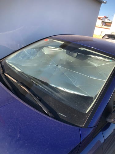 Customer photo review of Parasol Plegable para Coche Tipo Paraguas