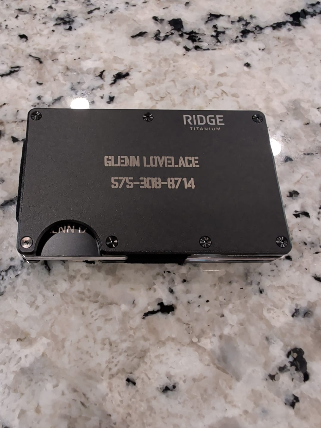 Customer photo review of Titanium Wallet | Money Clip