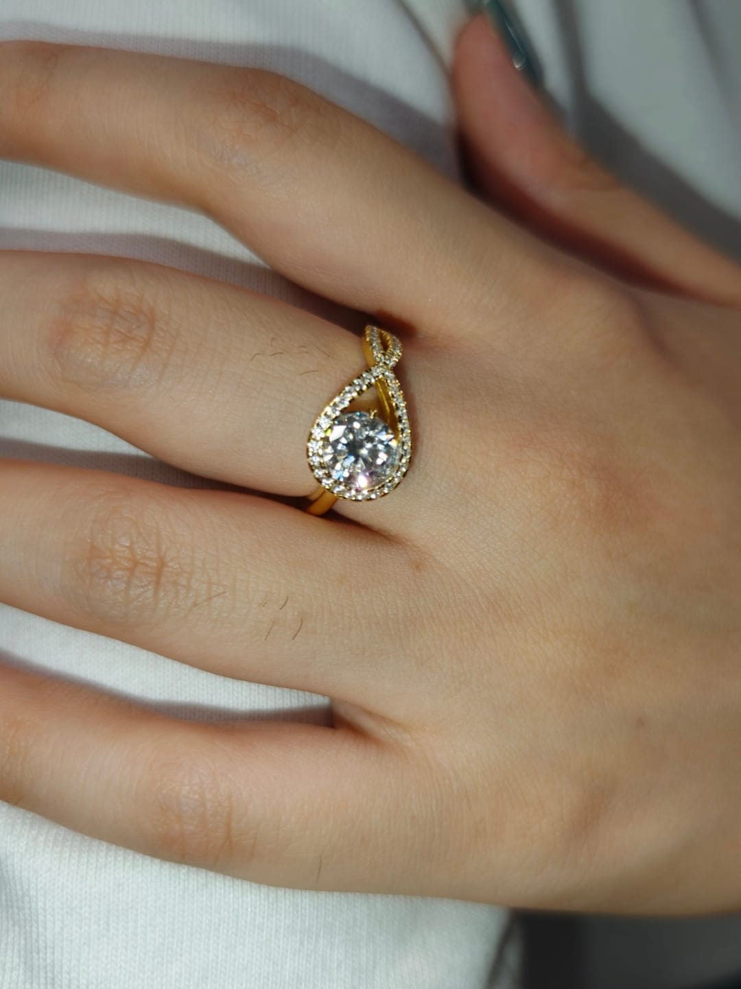 Customer photo review of S925 Moissanite Halo 1.2Ct Round Cut Yellow Gold Engagement Ring