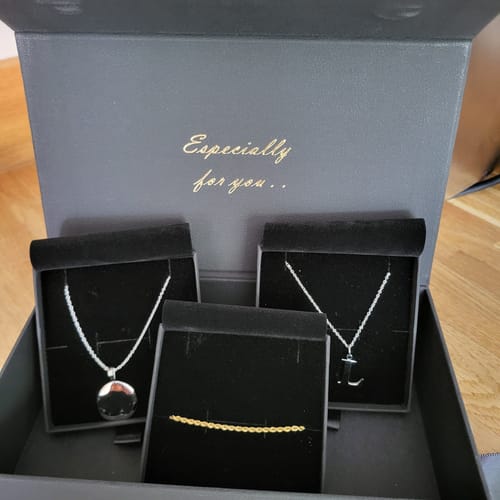 Customer photo review of Maya Circle Pendant Necklace in Silver
