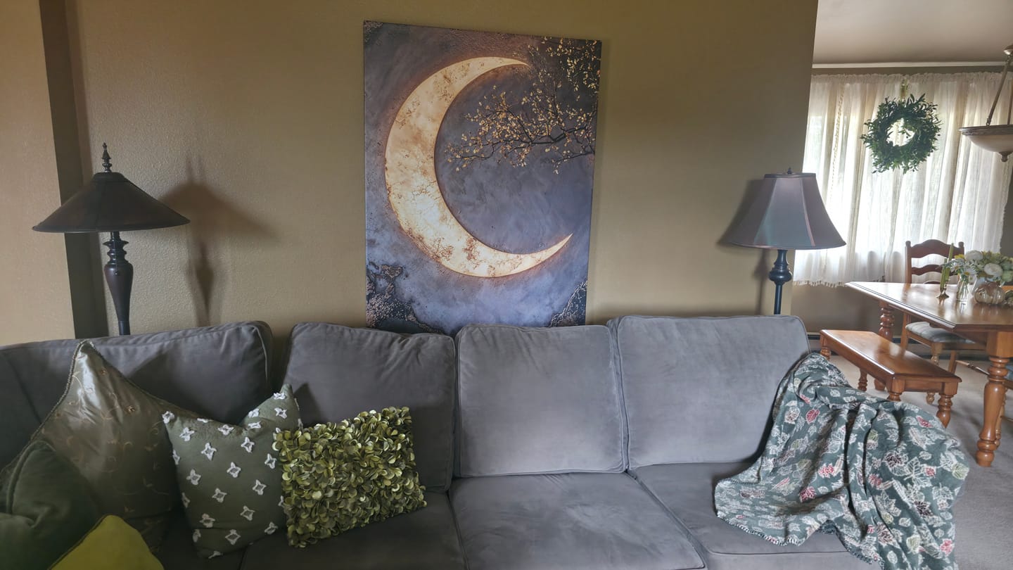 Customer photo review of Luxury Crescent Moon Canvas Wall Decor – Illuminated Gold and Grey Artwork