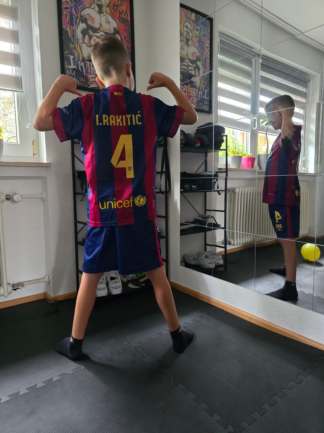 Customer photo review of Ivan Rakitić #4 Barcelona 2015 Champions League Final Kids Retro Jersey