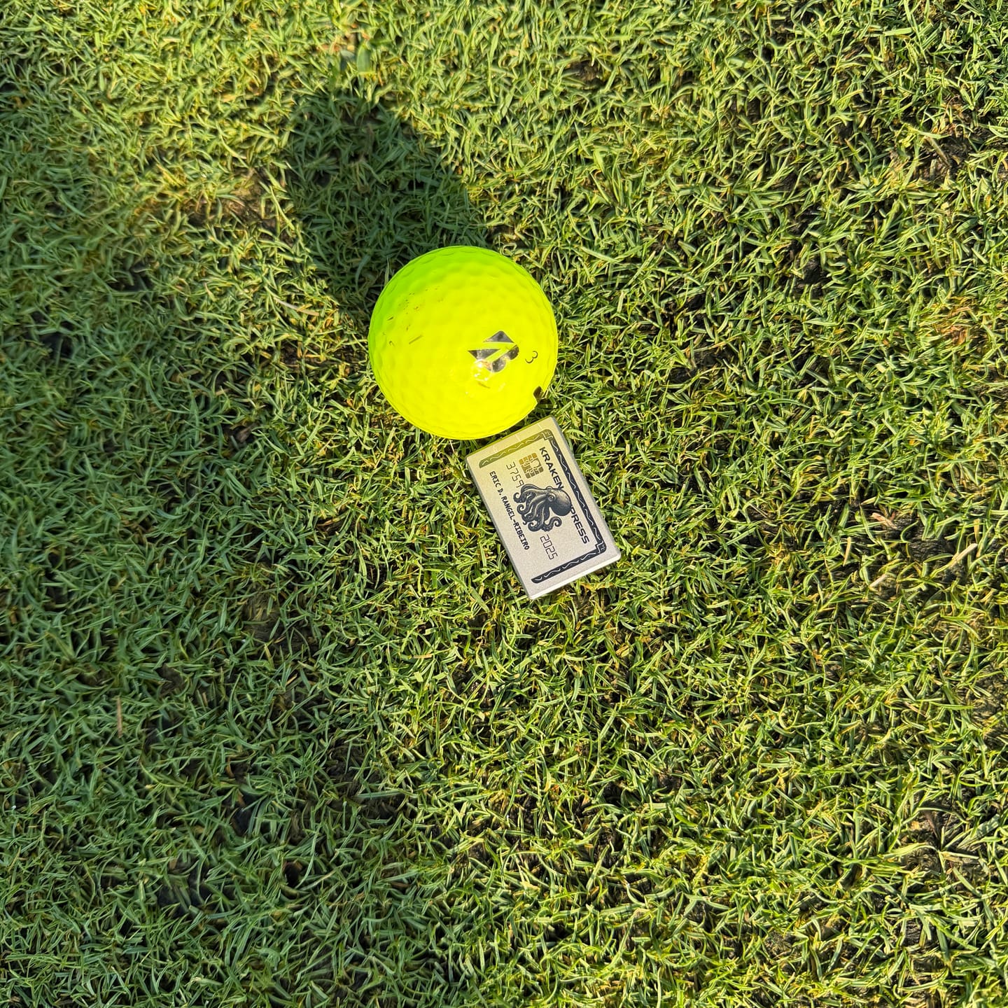 Customer photo review of The Silver Kraken Express Ball Marker | Kraken Titanium Golf Ball Marker