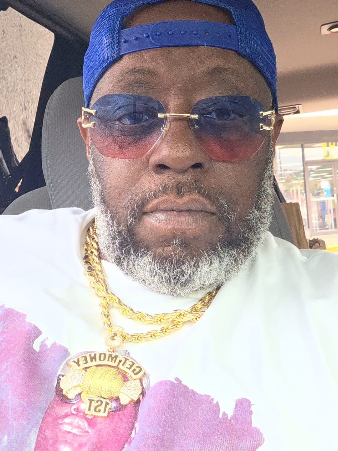 Customer photo review of Get Money 1st Pendant