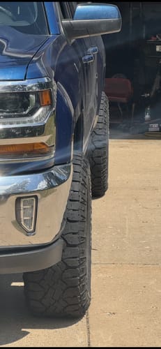 Customer's Chevy Silverado with installed wheel spacers, showing the extended, wider tire stance.