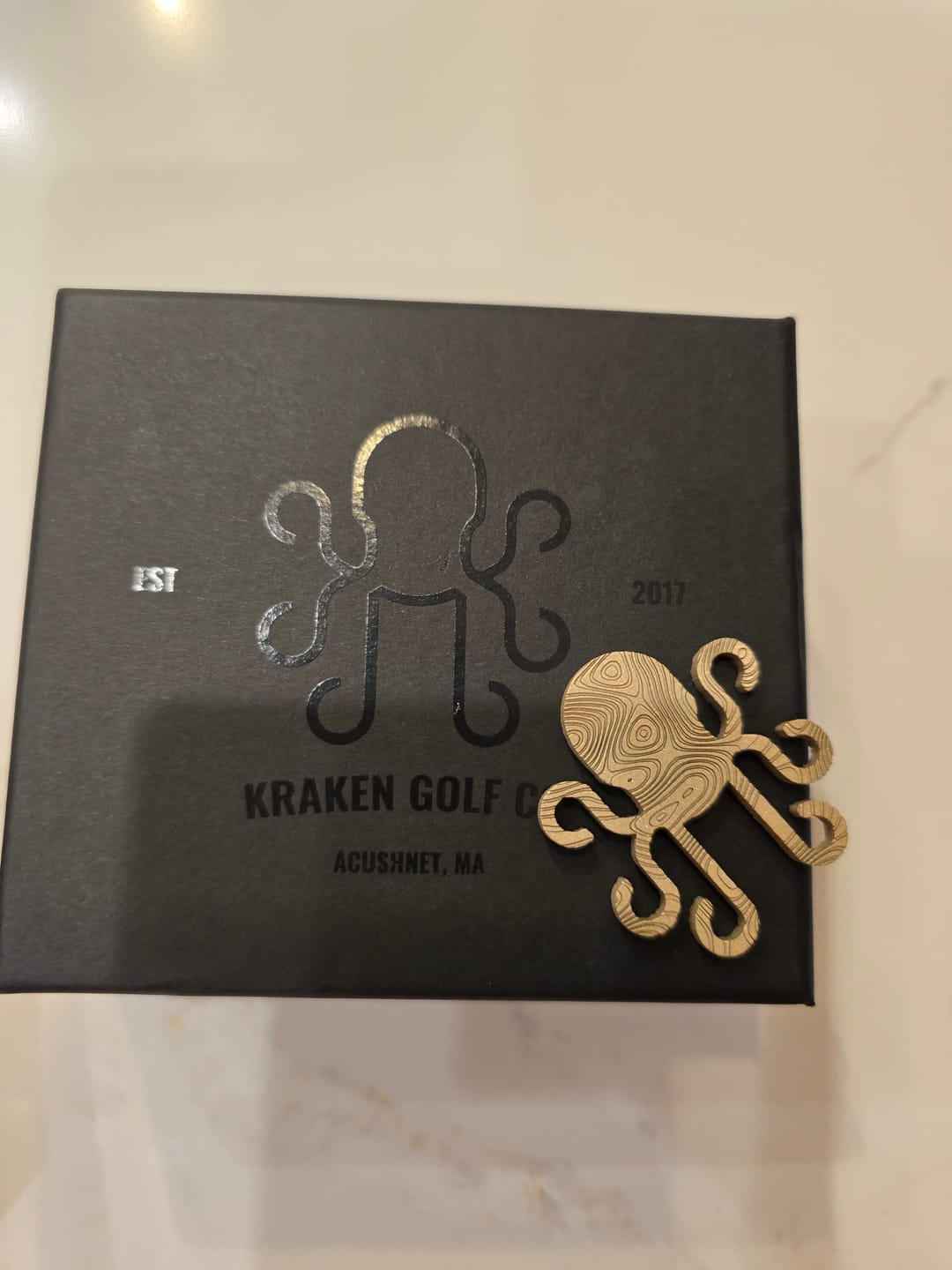Customer photo review of Kraken Logo Ball Marker - Brass Damascus