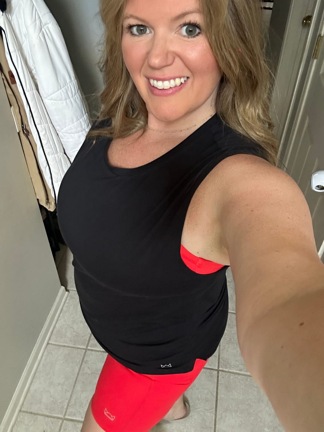 Customer photo review of Flowy Scoop Hem Muscle Tank