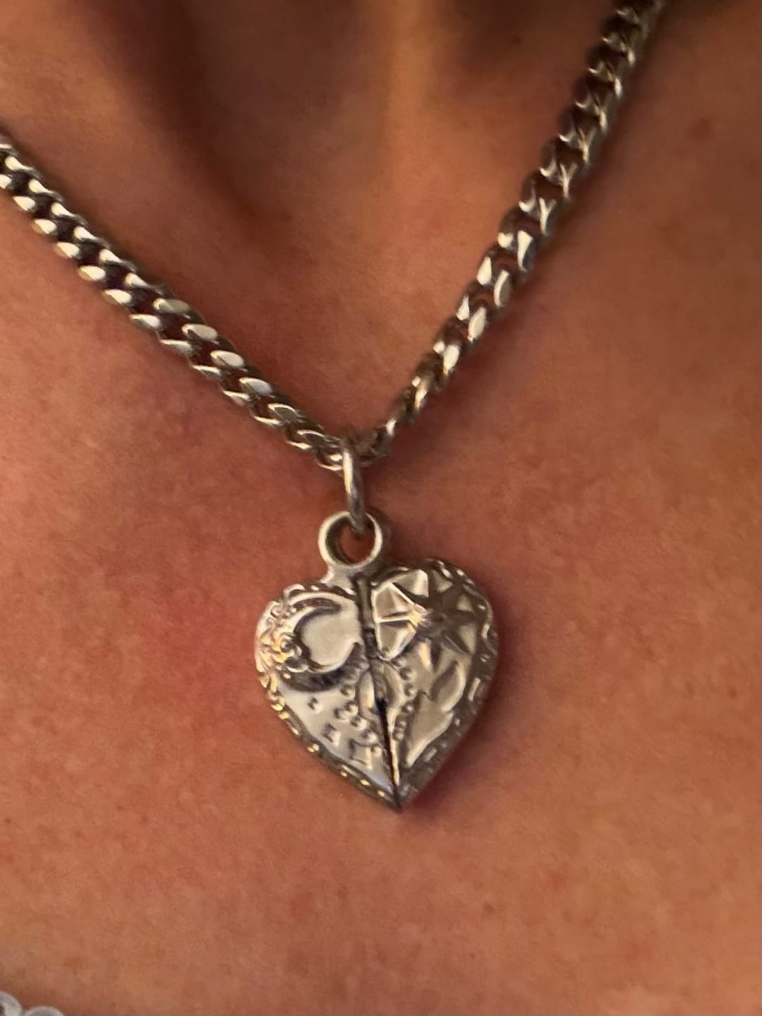 Customer photo review of COSMIC HEART PENDANT
