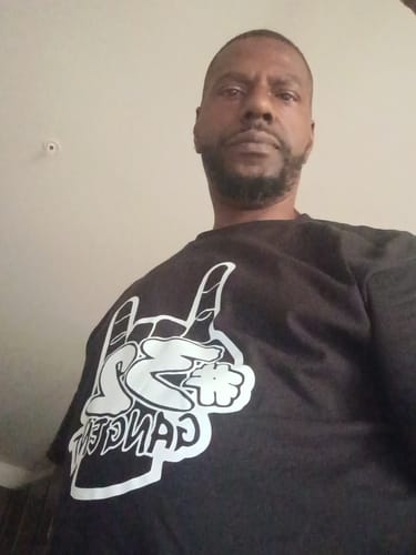 Customer photo review of 32 GANG BUDGET TEE
