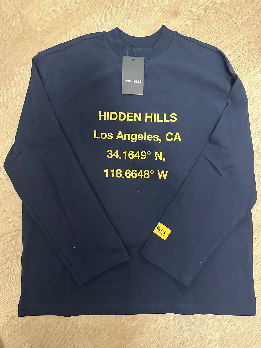 Customer photo review of VINTAGE LOGO LONGSLEEVE T-SHIRT AMBER/NAVY