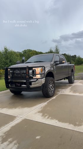 Customer's gray Ford F-series truck with a wider stance after installing the 2" wheel spacers.