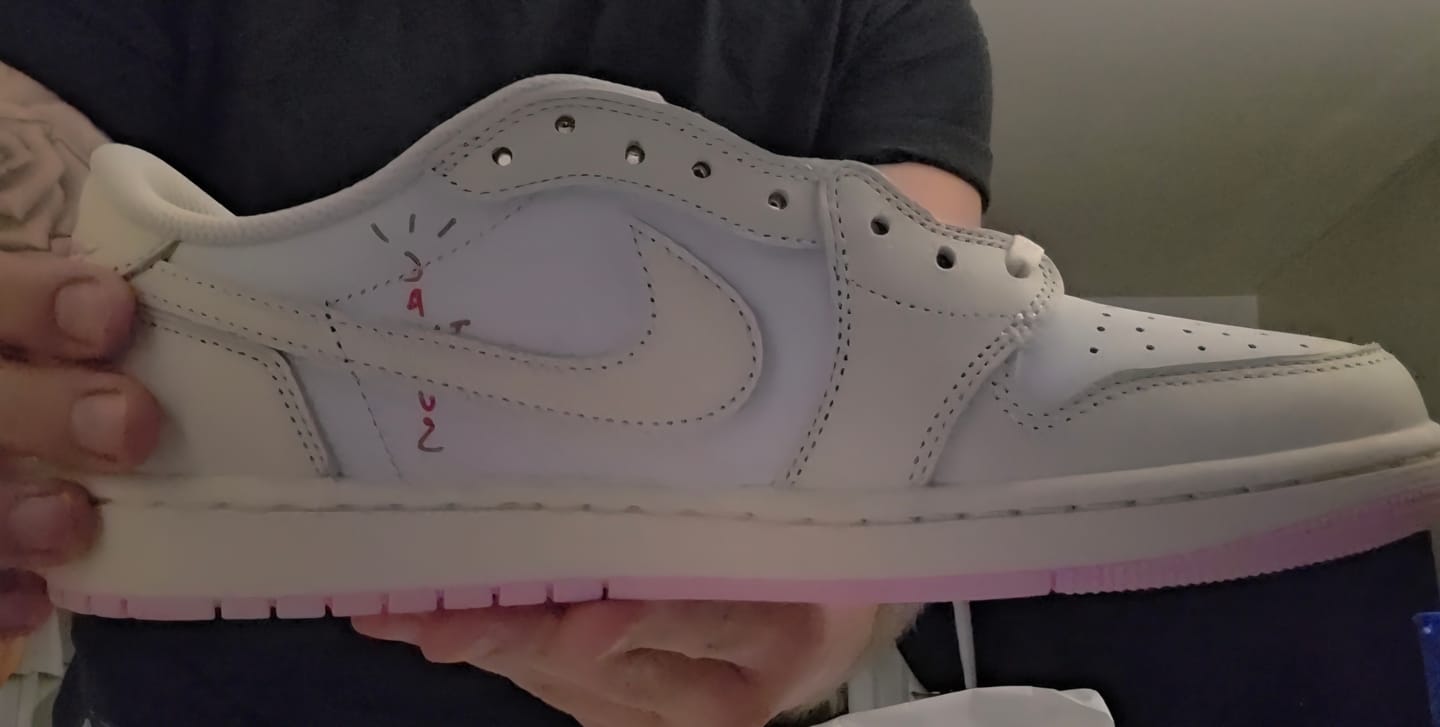 Customer photo review of Travis Scott x AJ1 Low OG 'Muslin Shy Pink'