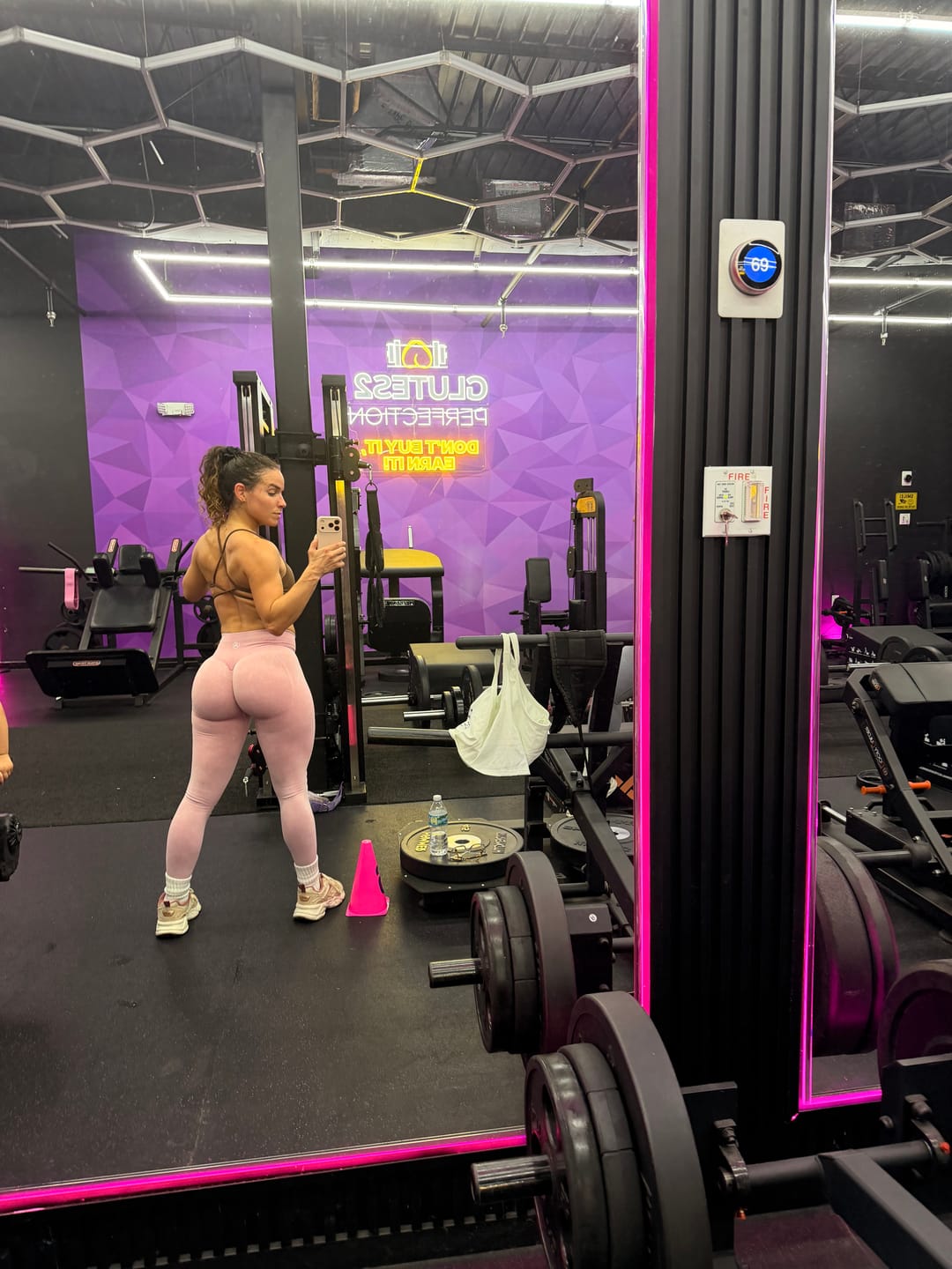 Customer photo review of Pink Sculpting Acid Wash Scrunch Butt Leggings