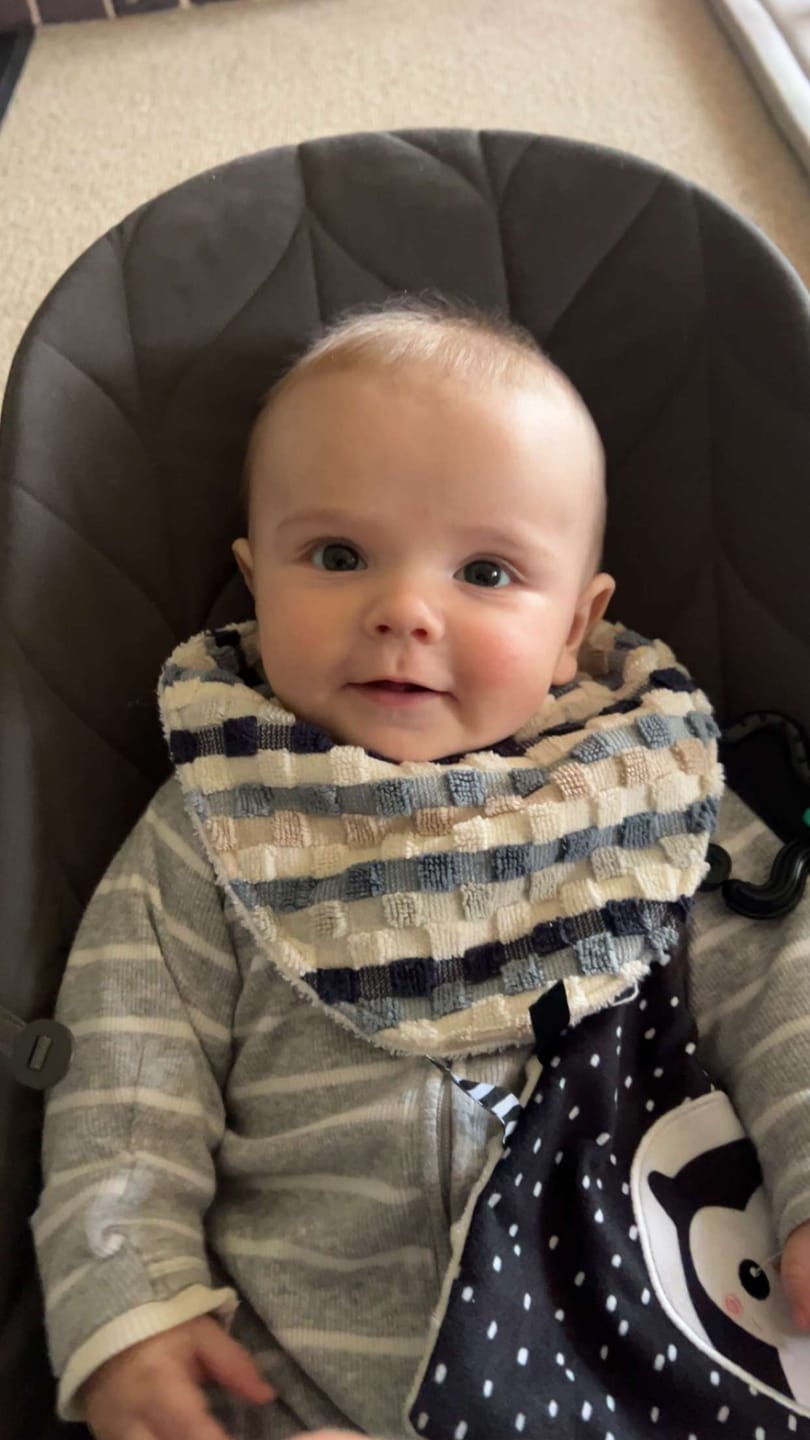 Customer photo review of Sandy Toes Signature Bib