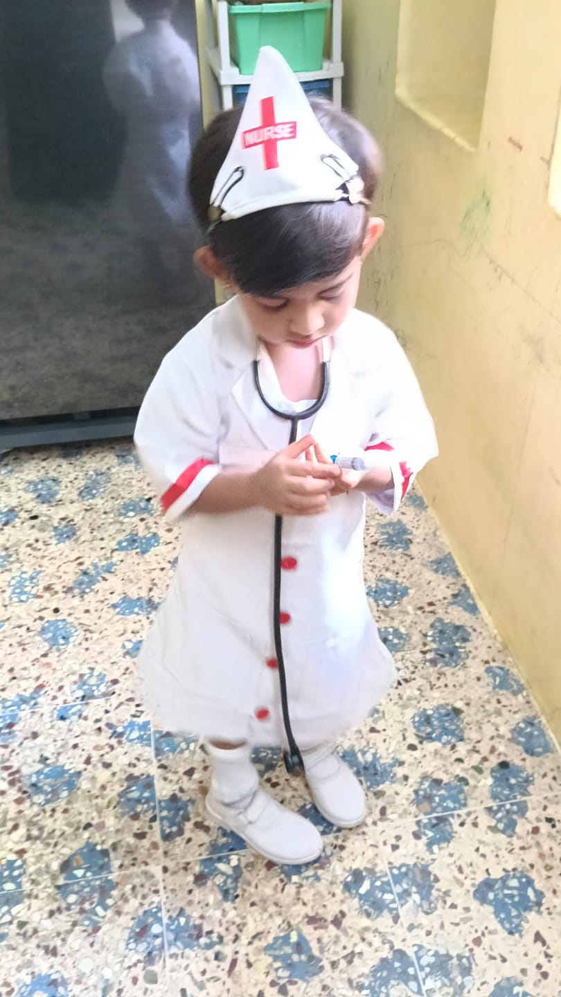Customer photo review of Fancydresswale Nurse costume for Girls Community helper theme costume for facy dress competitions