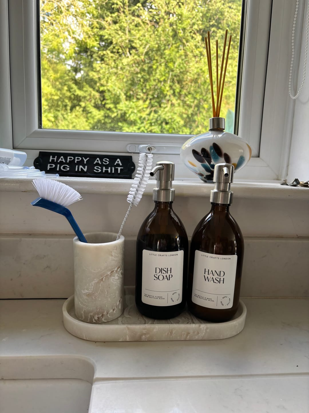 Customer photo review of 500ml Amber Glass Bottle with Metal Pump White Label