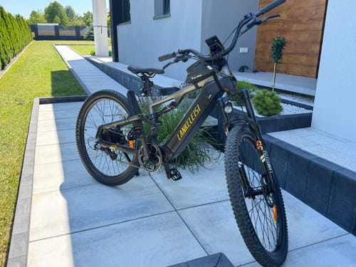 Customer's Lankeleisi MG600 Pro e-mountain bike parked on a patio outdoors.