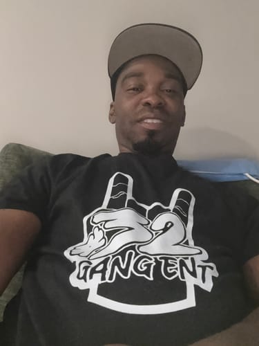 Customer photo review of 32 GANG BUDGET TEE