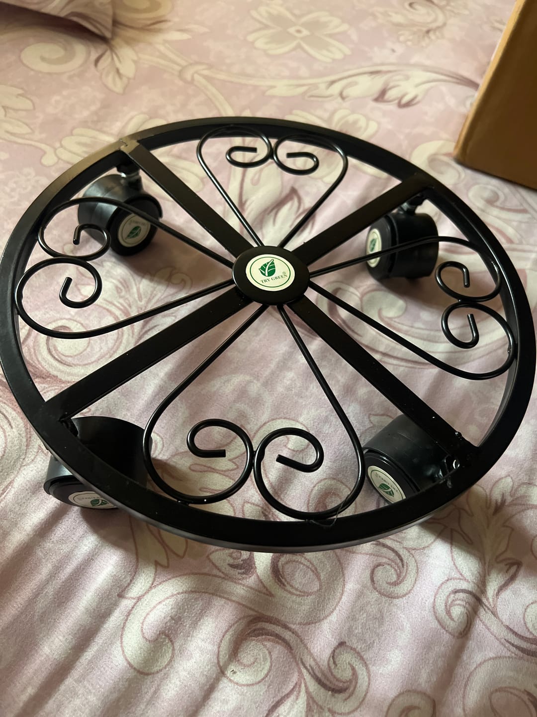 Customer photo review of TryGreen Ivy Wheel Rolling Plant Stand for Planters