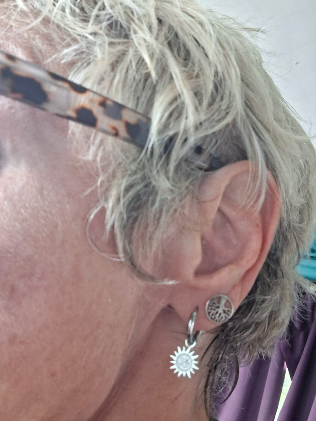 Customer photo review of The Sun and Moon Hoop Silver Earrings