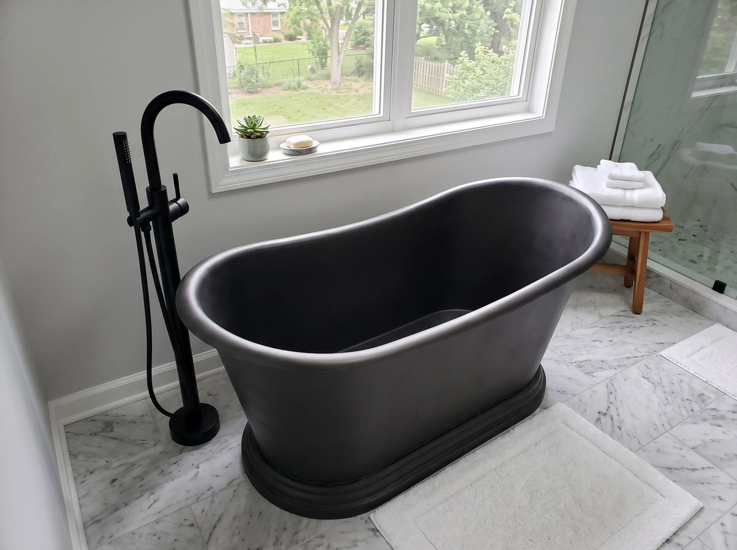 Customer photo review of Elite Double-Slipper Pedestal Oil Rubbed Bronze Copper Freestanding Bathtub ET-C-DS13