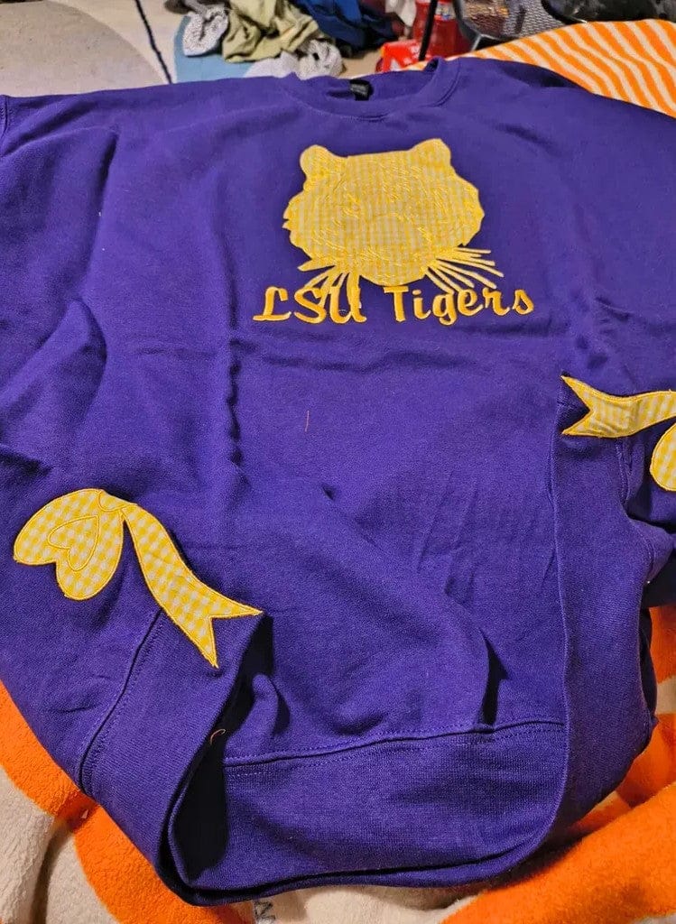 Customer photo review of Custom Tennessee Volunteers Women’s Team Spirit Sweatshirt – Applique Embroidered Side Bow Pullover