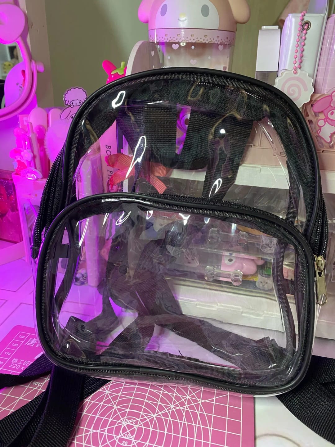 Customer photo review of Mini Mochila de Plástico Transparente