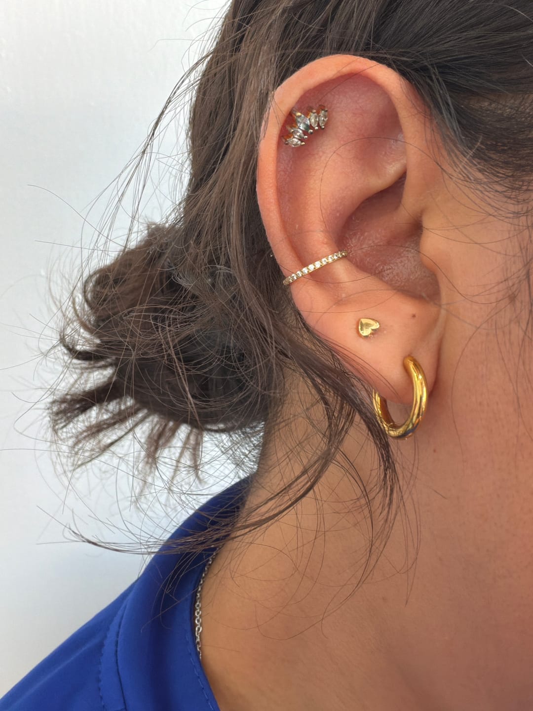 Customer photo review of Piercing Infinity con Zirconias Titanio