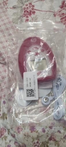 Customer photo review of Electric Facial Massager Stimulate and Relax Facial Muscles for Face Slimming