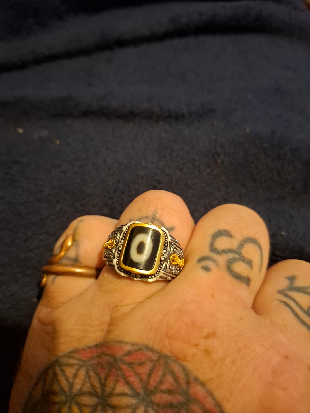 Customer photo review of Clarity Dzi Silver Protection Tibetan Treasure Ring