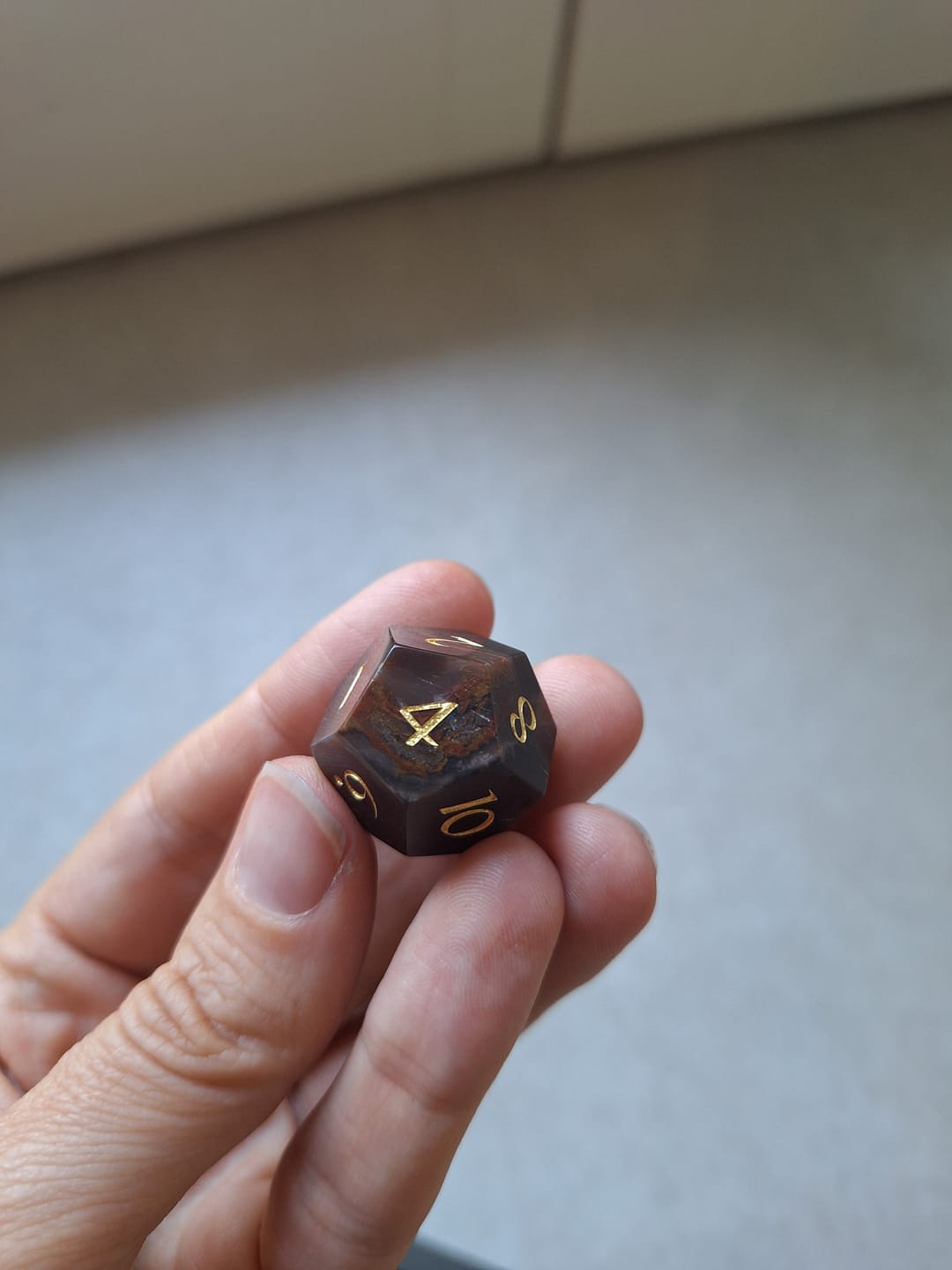 Customer photo review of URWizards D&D Petrified Wood Gemstone Engraved Dice Set(Limited edition)