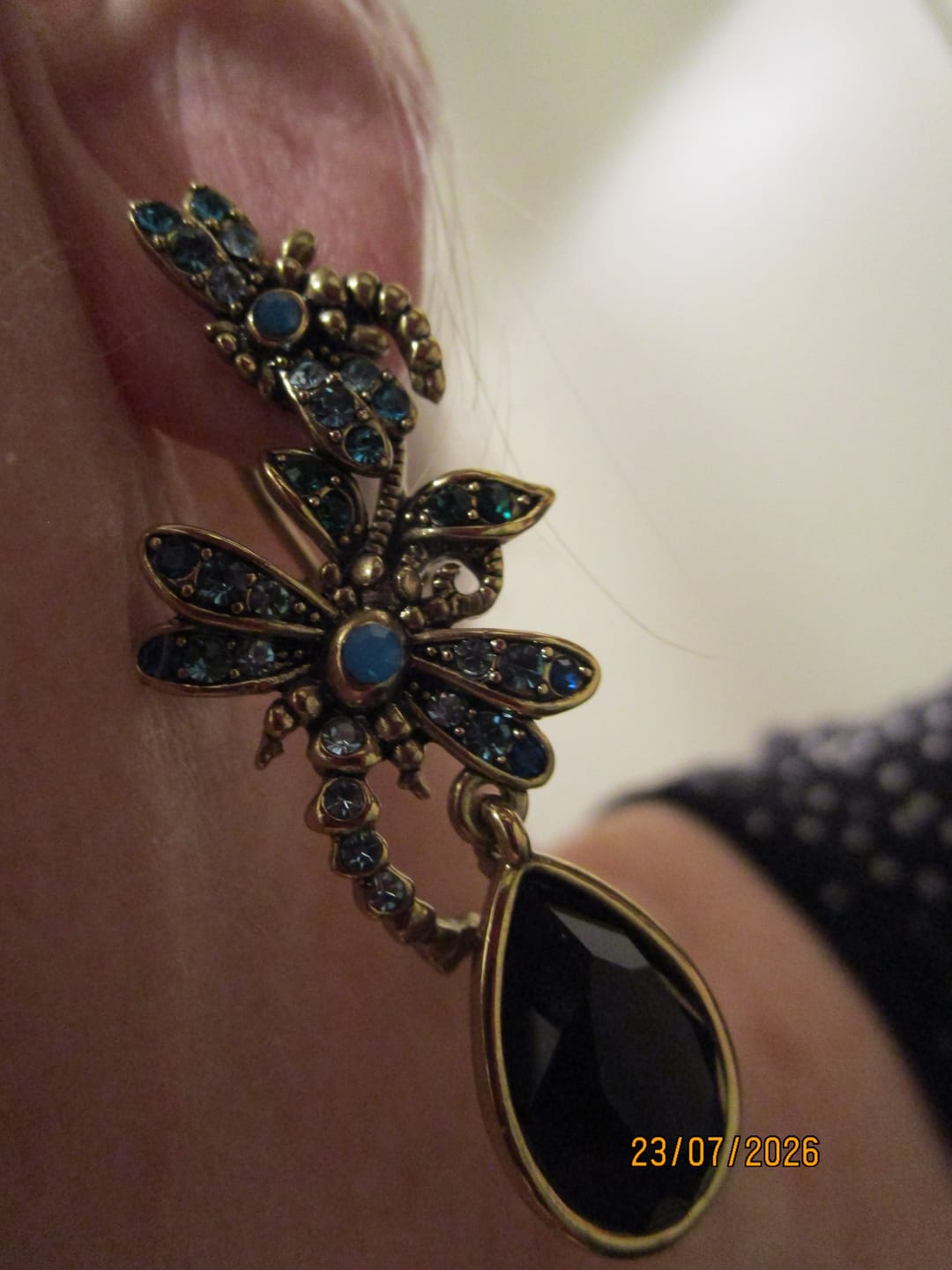 Customer photo review of HEIDI DAUS® "Dramatic Demoiselle" Crystal Dragonfly Dangle Earring