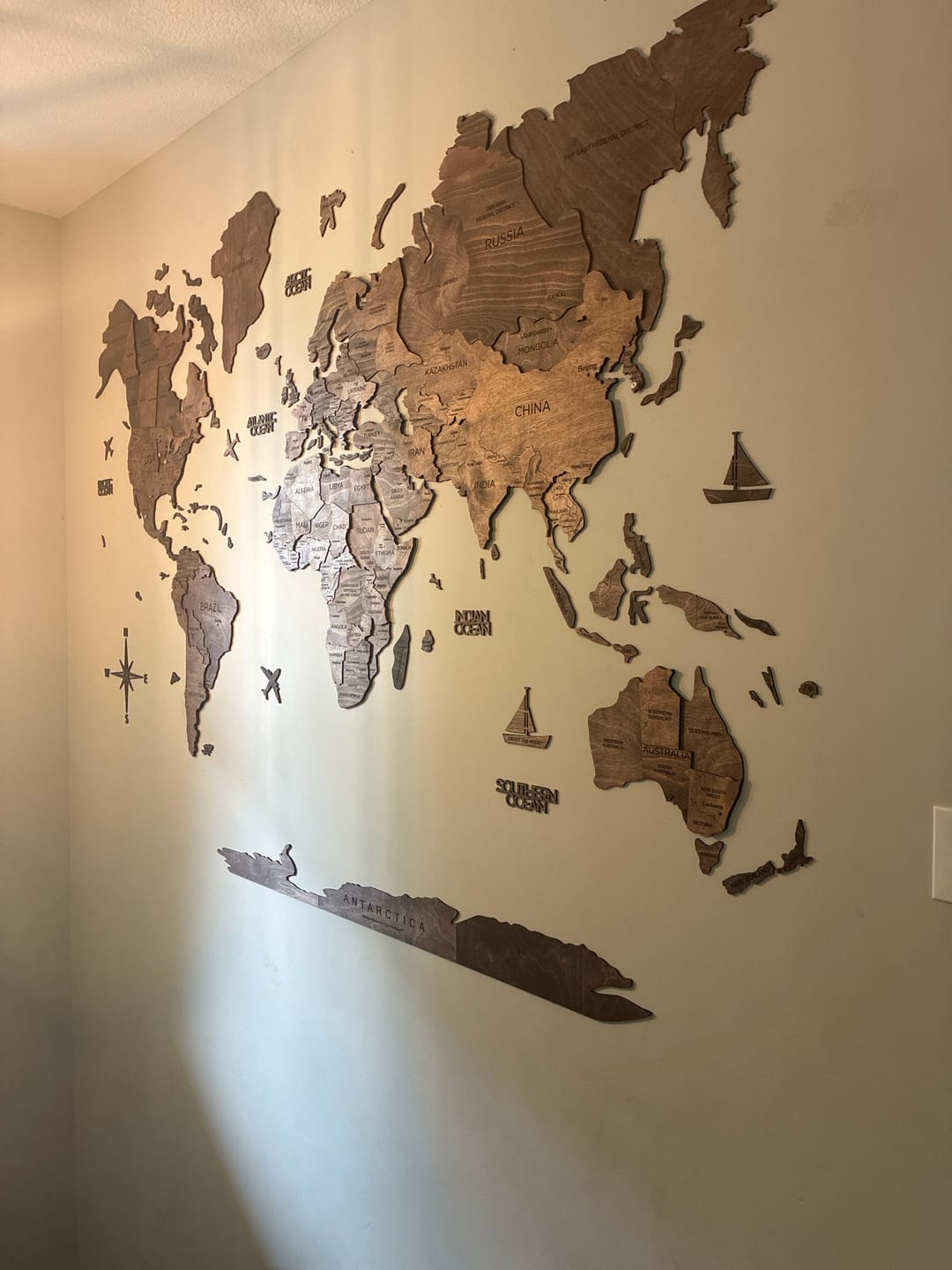 Customer photo review of 3D Wooden World Map Dark Walnut