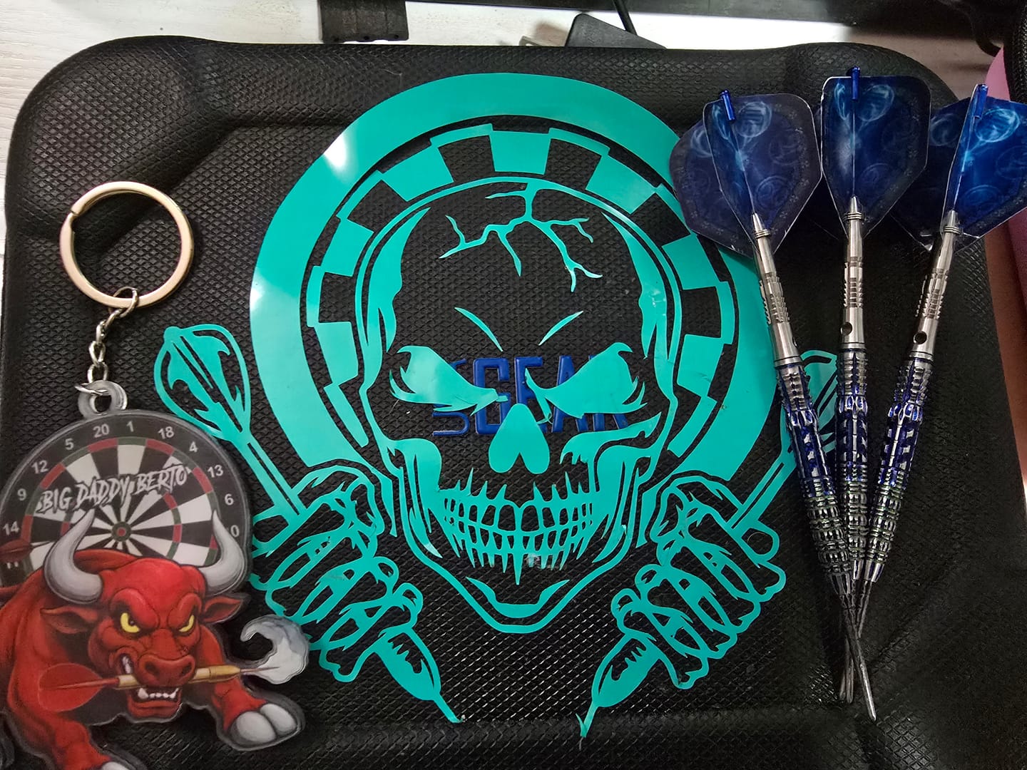 Customer photo review of Maxcorners Angry Red Bull Darts Personalized Name Keychain