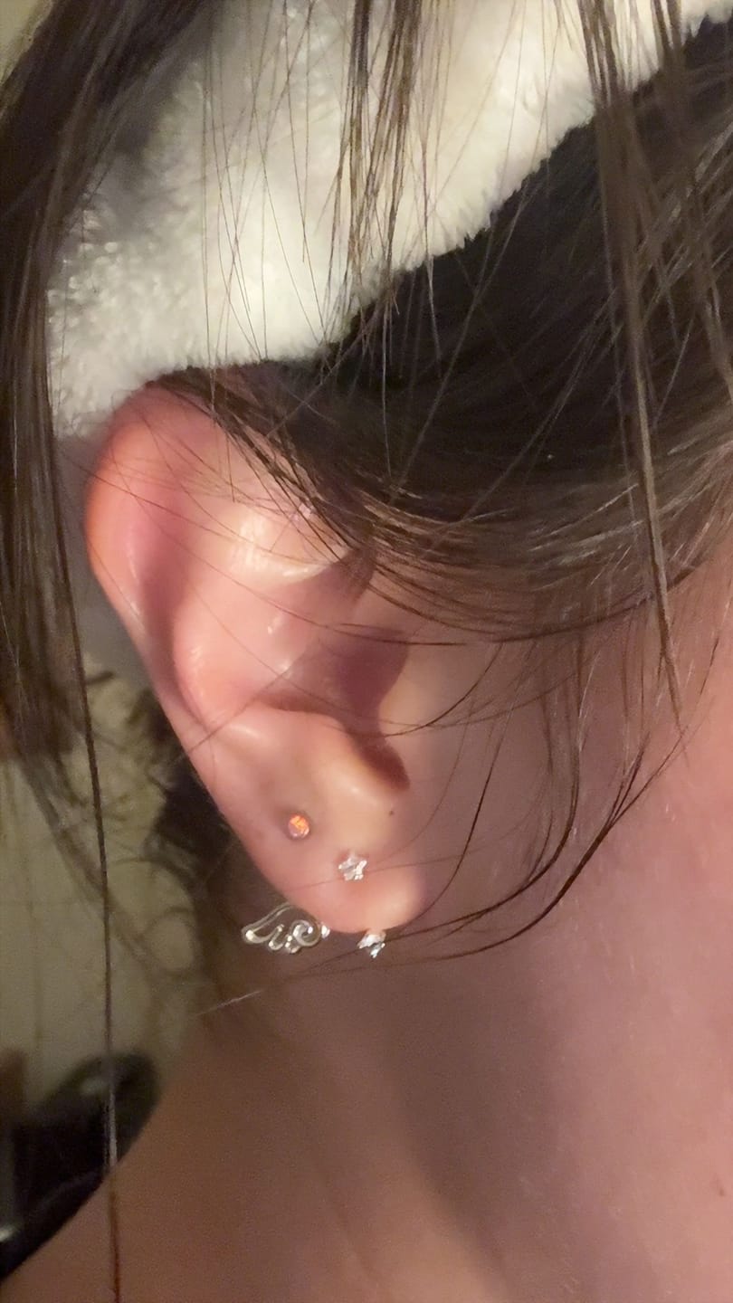 Customer photo review of Winged Grace Platinum Plating 925Pin Tiny Wing Stud Earrings™