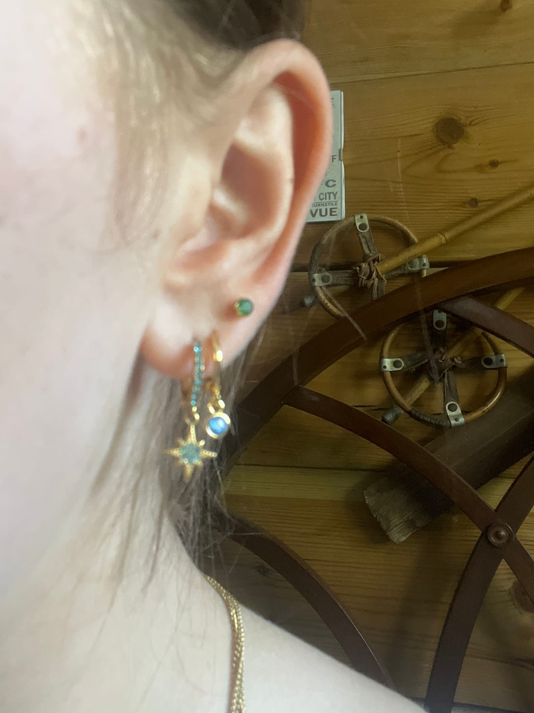 Customer photo review of Cosima Gold Turquoise Star Huggie Earrings