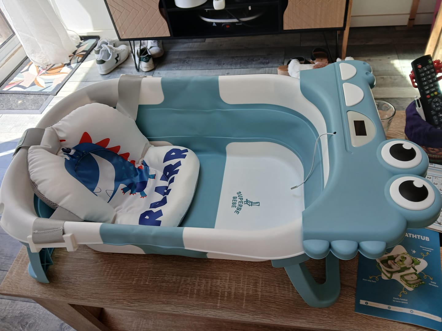 Customer photo review of Baignoire bébé pliable compacte DINO – Coussin & thermomètre inclus
