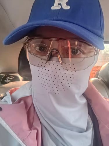 Customer wearing glasses with stick-on vision lenses