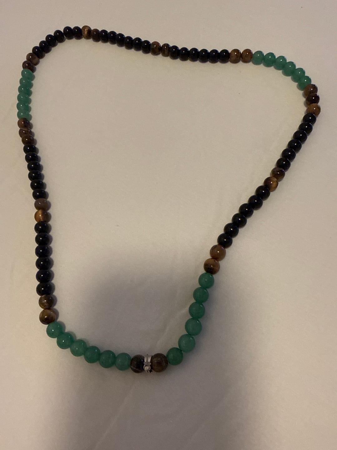 Customer photo review of ✨ Money Attraction Necklace With GreenAventurine & Tiger Eye Pendant Healing Crystal Stone