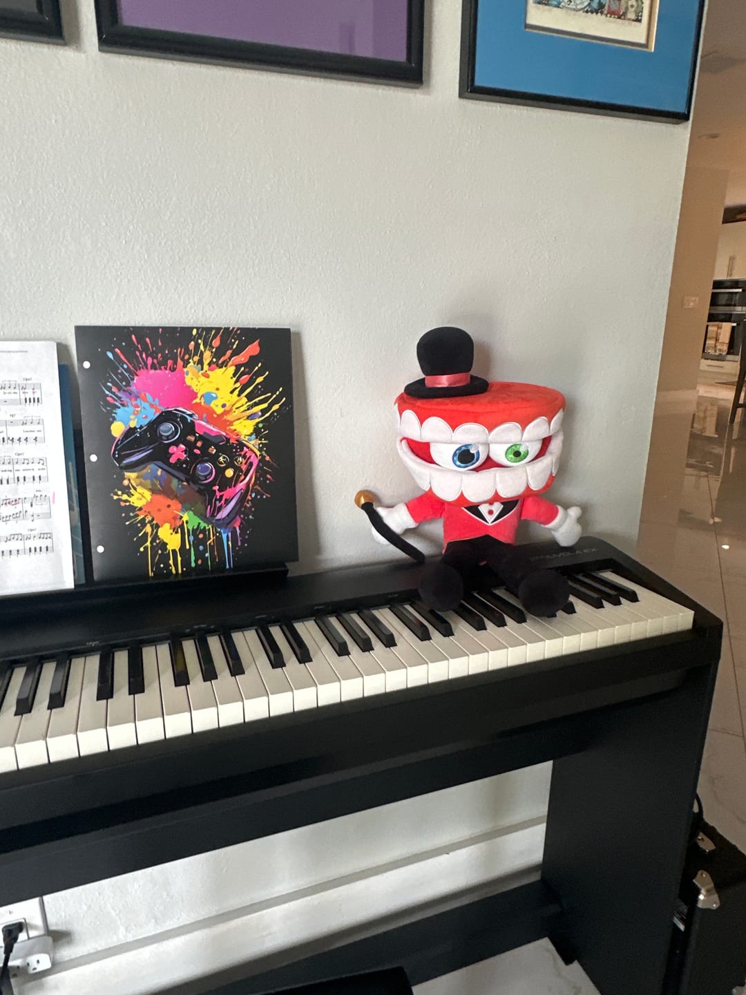 Customer photo review of Caine Puppet Plush
