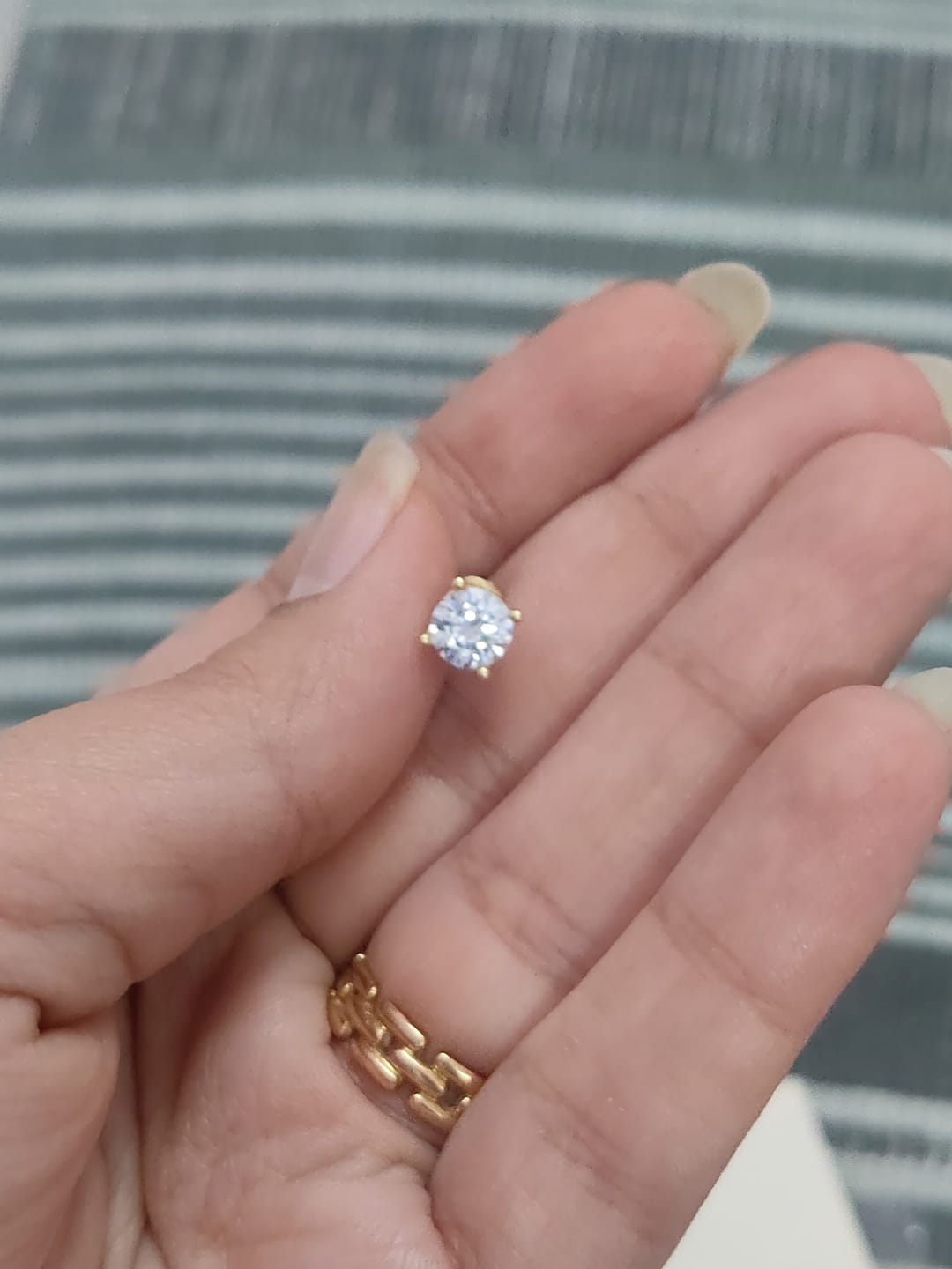 Customer photo review of Gold Round Solitaire Studds by Arushaa