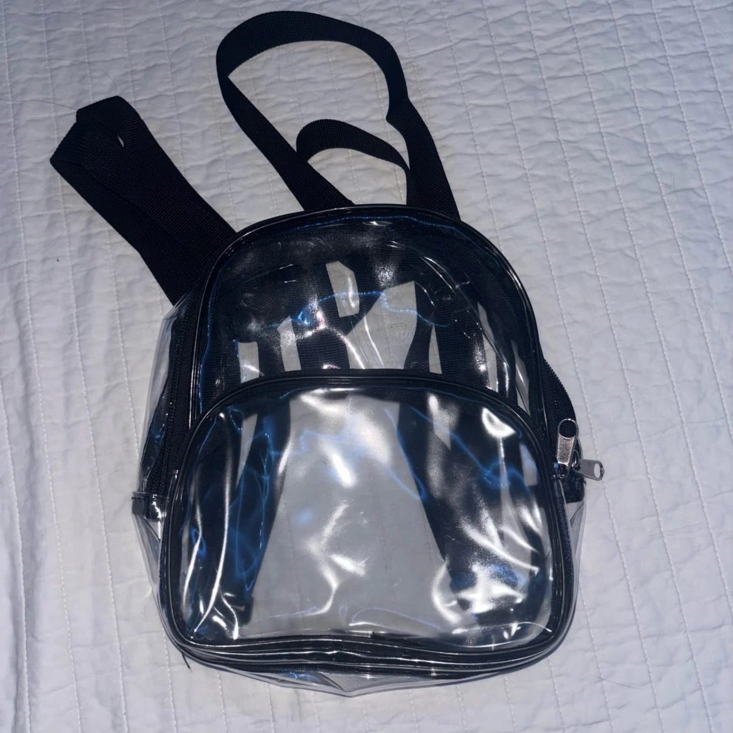 Customer photo review of Mini Mochila de Plástico Transparente