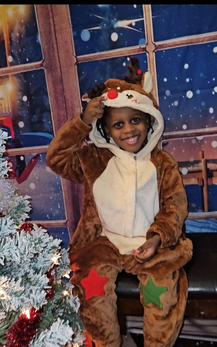 Customer photo review of OLAOLA Kids Reindeer Animal Onesie Christmas Plush Soft Flannel Warm Home Pajamas One-Piece Sleepwear