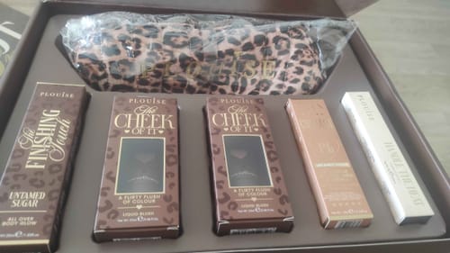 Customer's Budget Box containing four beauty products in leopard print packaging