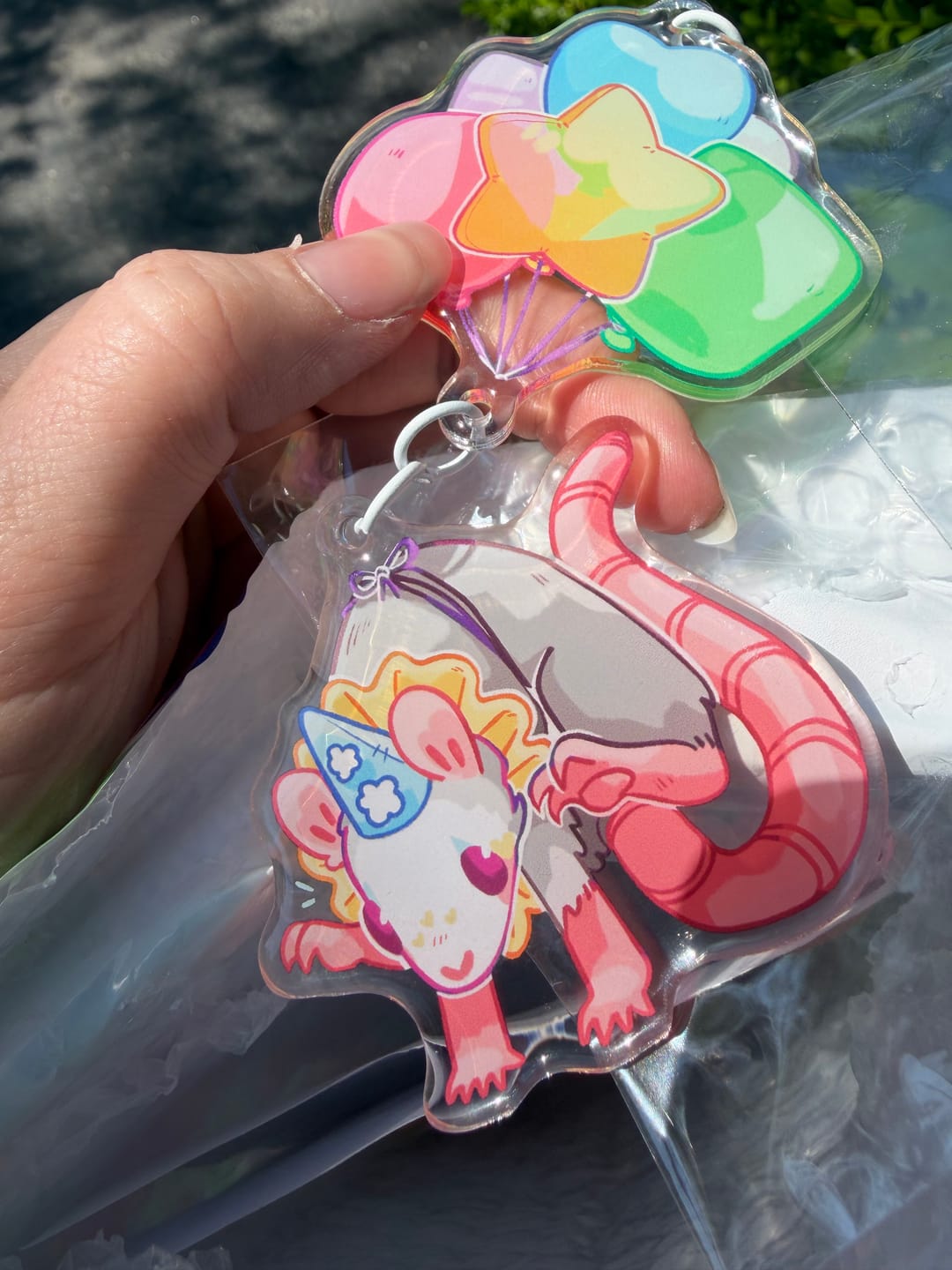 Customer photo review of Rat Party Balloon Clown Keychain!