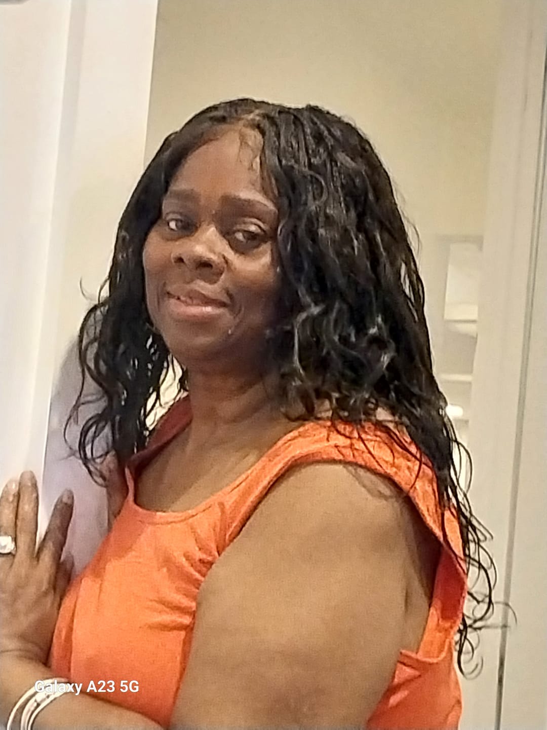 Customer photo review of Michelle - Salon-Style Glueless Miracle Braided Wig Pre-Bleached Swiss HD Full Lace Boho Box Braids Bora Bora Human Hair Body Wave Curls