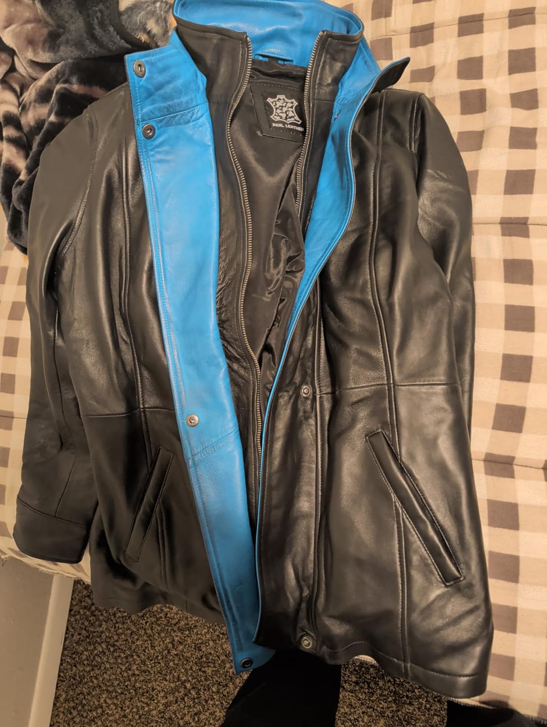 Customer photo review of Erin Women's Black Leather Jacket with Blue Inner Lapel