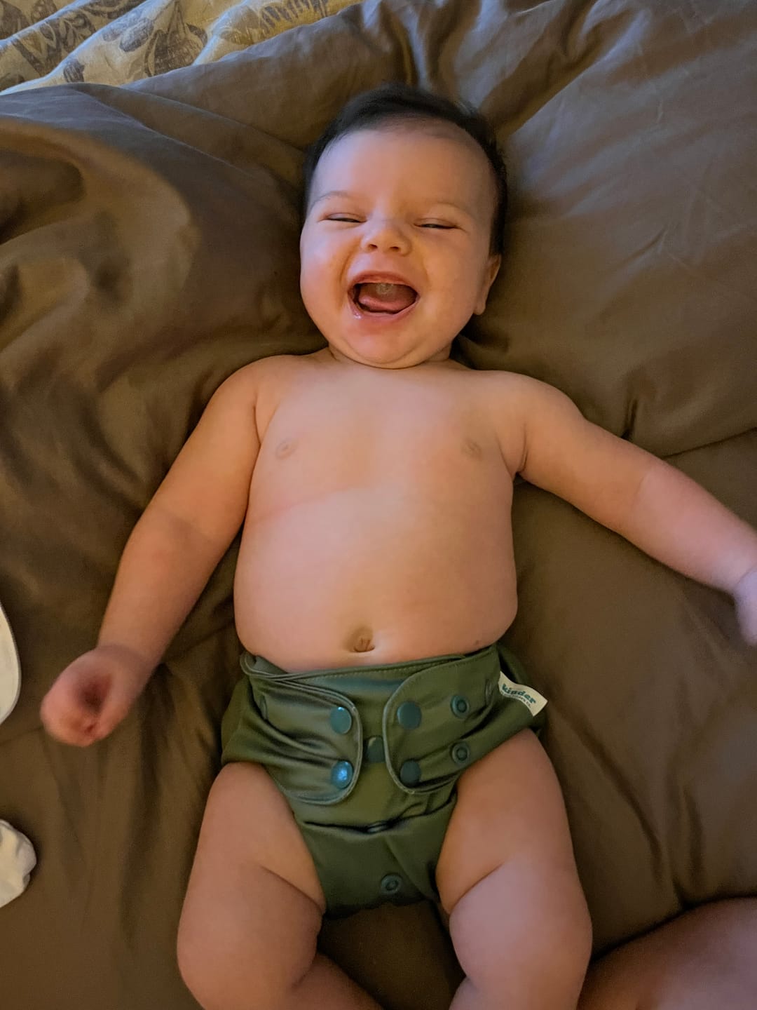 Customer photo review of Solid Color: Essentials Pocket Cloth Diaper with Athletic Wicking Jersey, Grows with your Baby