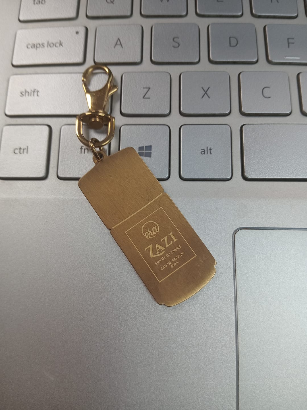 Customer photo review of ZAZI Eau de Parfum Key Holder – Gold Tone